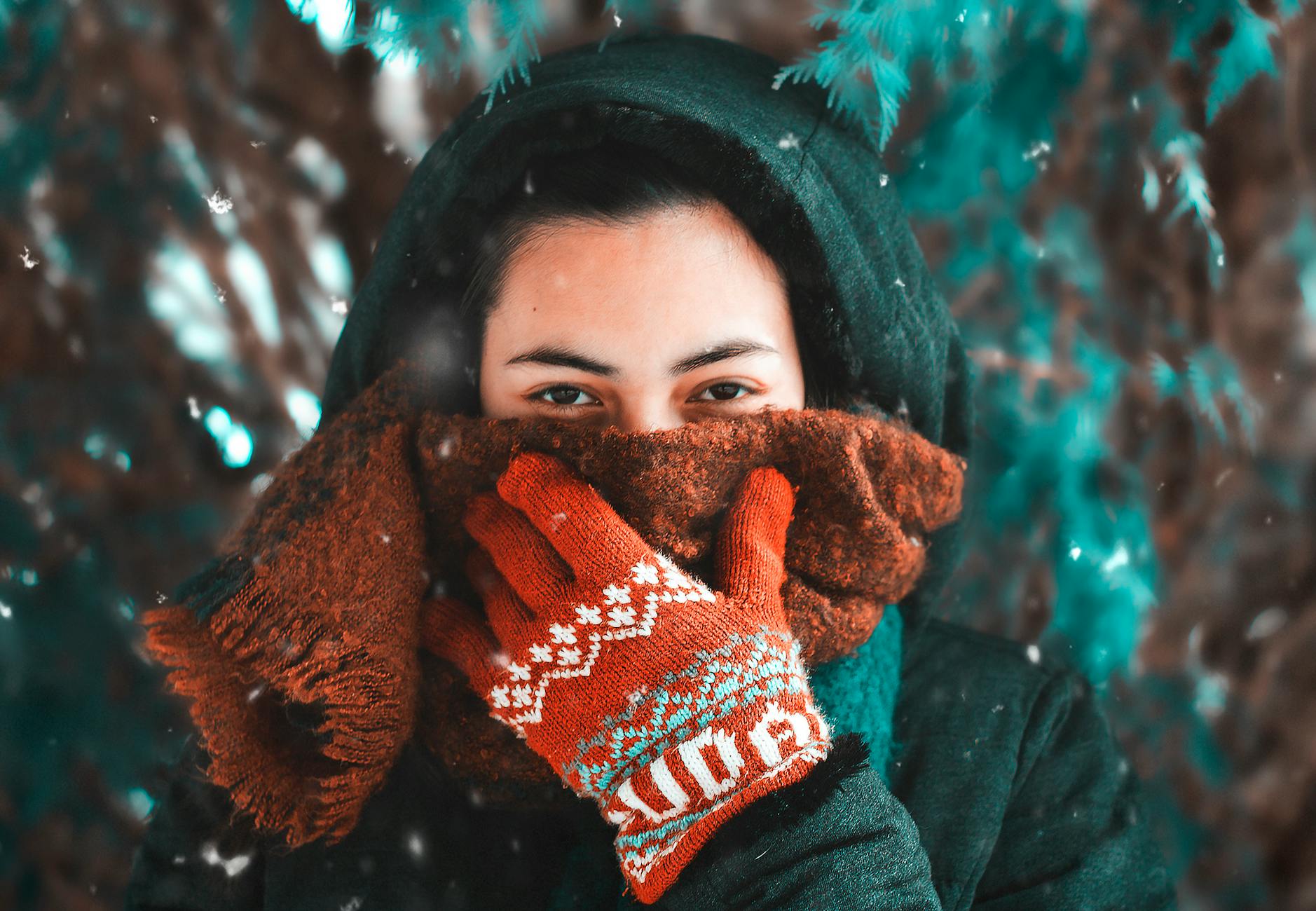 woman covering face with scarf